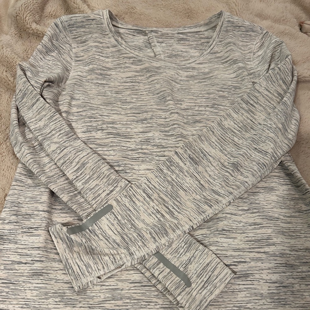 Zyia tie back athletic shirt size large but fits like a medium